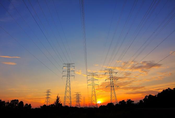 Hydro towers with sunset in background