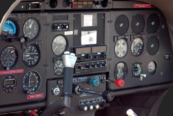 airplane cockpit showing instrumentation used by pilots.